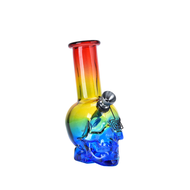 Colorful glass skull-shaped water pipe with rainbow gradient on a white background